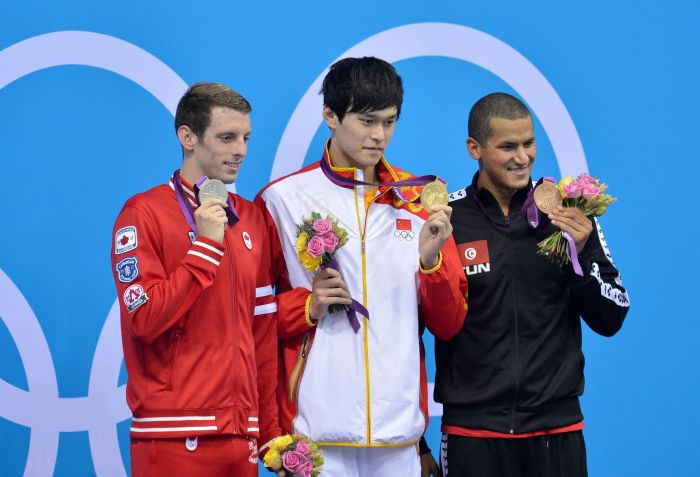 孙杨获得男子1500米自由泳冠军并打破世界纪